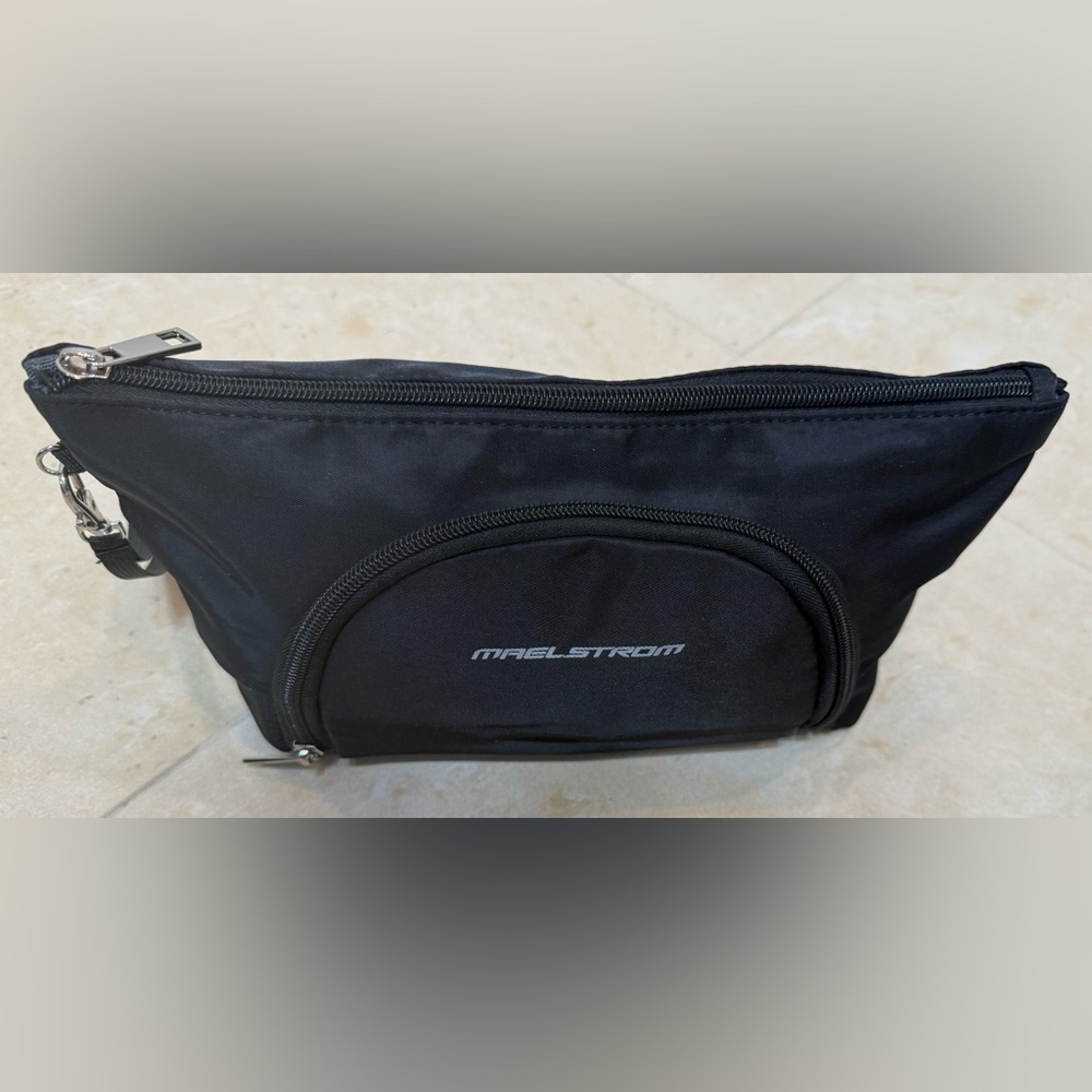 Maelstrom Women Black Cosmetic Bag of Nylon Material . Used